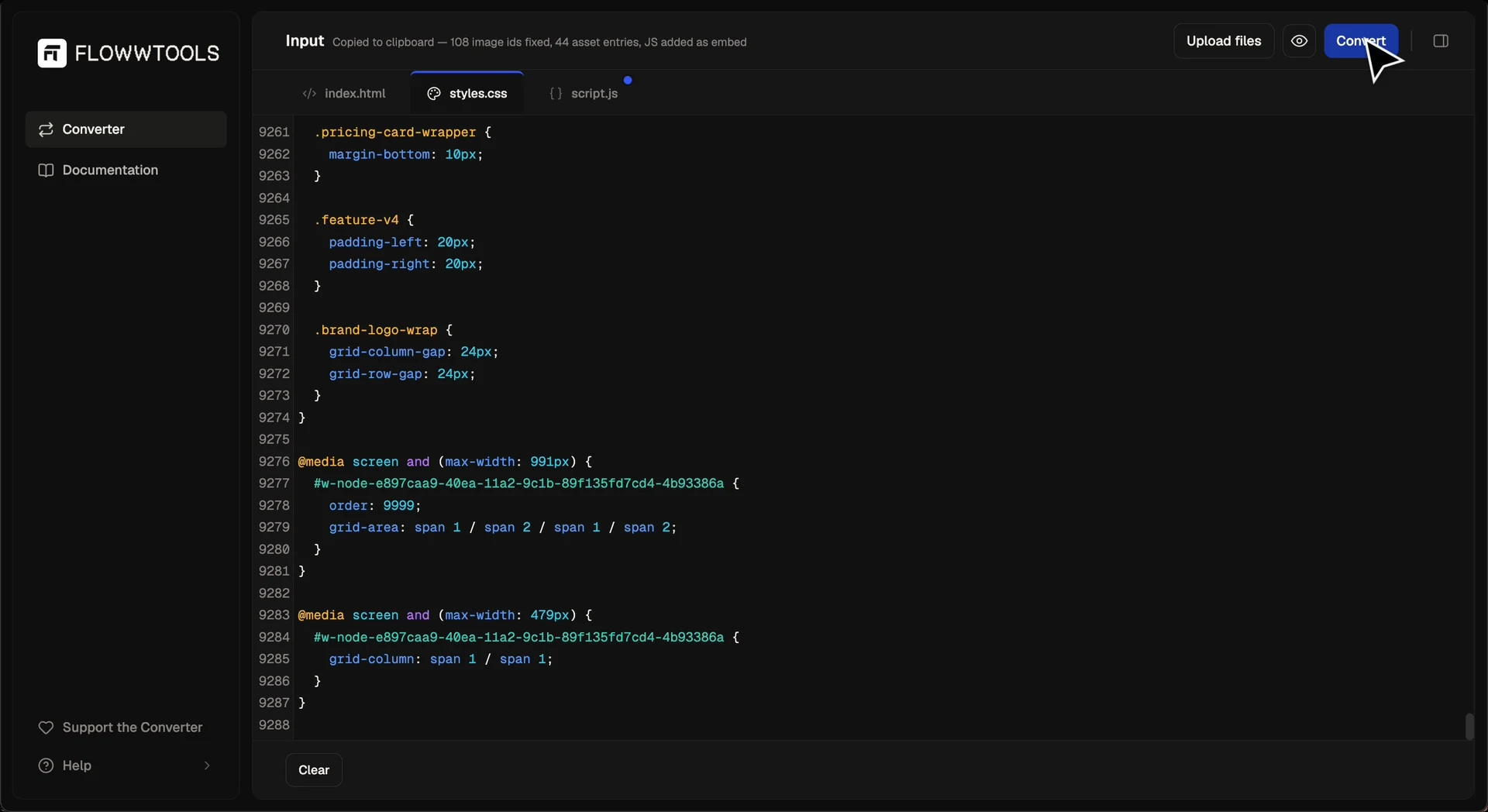 The Code Converter interface: the index.html, styles.css and script.js editors with the toolbar above them, after a run has copied the result to the clipboard.
